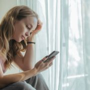 Tween Girl Looking at Phone